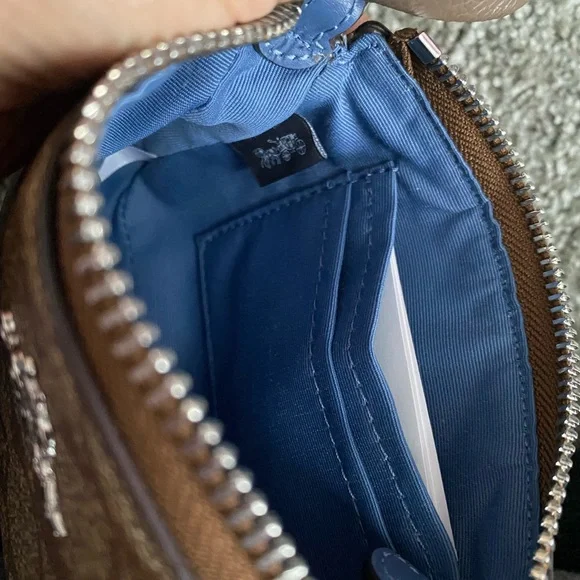 Coach Wristlet NWT. Brand New come with gift box&paper bag. 😊 Price is Firm😊 - Picture 6 of 12